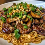 Pâtes boeuf champignons arachides